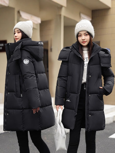 Sophisticated Winter Coat for Women Featuring a Hood And a Full Zipper, Perfect for Chilly Days. This Long-Sleeve Jacket Offers a Tailored Fit And Is Suitable for Both Outdoor And Everyday Travel. Dry Clean Only, Made with High-Quality Materials