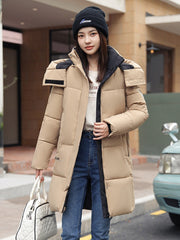 Sophisticated Winter Coat for Women Featuring a Hood And a Full Zipper, Perfect for Chilly Days. This Long-Sleeve Jacket Offers a Tailored Fit And Is Suitable for Both Outdoor And Everyday Travel. Dry Clean Only, Made with High-Quality Materials