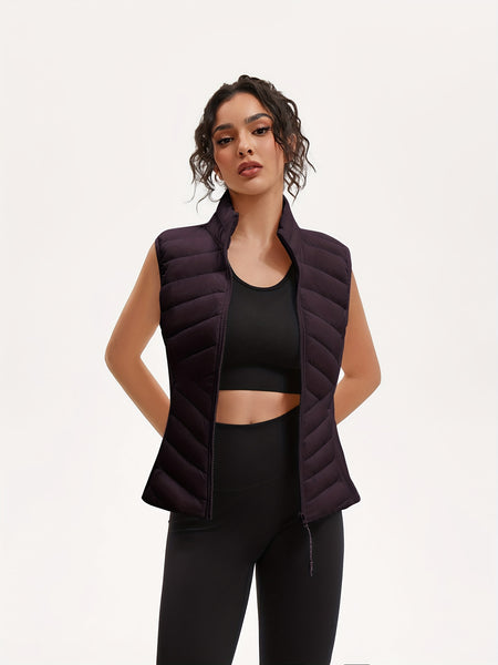 Women's Lightweight Outdoor Puffer Vest, Multi-Pocket Design, Elastic Waist Wrapping for Snug Warmth, Unique Zipper, Stand Collar, Polyester Filled