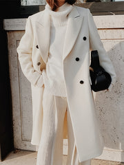 This Elegant Cream White Woolen Coat Features a Double-Breasted Design, Button Details, And a Slim Fit, Making It Perfect for Both Casual And Formal Events During The Fall And Winter Seasons.