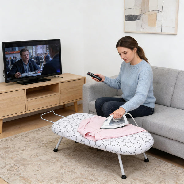 A Compact, Foldable Ironing Board Measuring 66X40Cm, Easy to Store And Lightweight, Making It Ideal for Small Living Spaces Like Apartments And Dorms. It Features Adjustable Height for Convenience