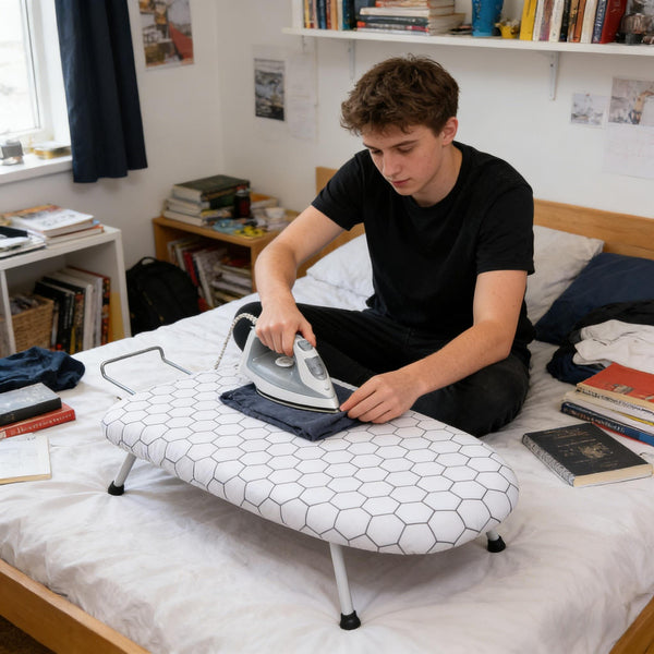 A Compact, Foldable Ironing Board Measuring 66X40Cm, Easy to Store And Lightweight, Making It Ideal for Small Living Spaces Like Apartments And Dorms. It Features Adjustable Height for Convenience