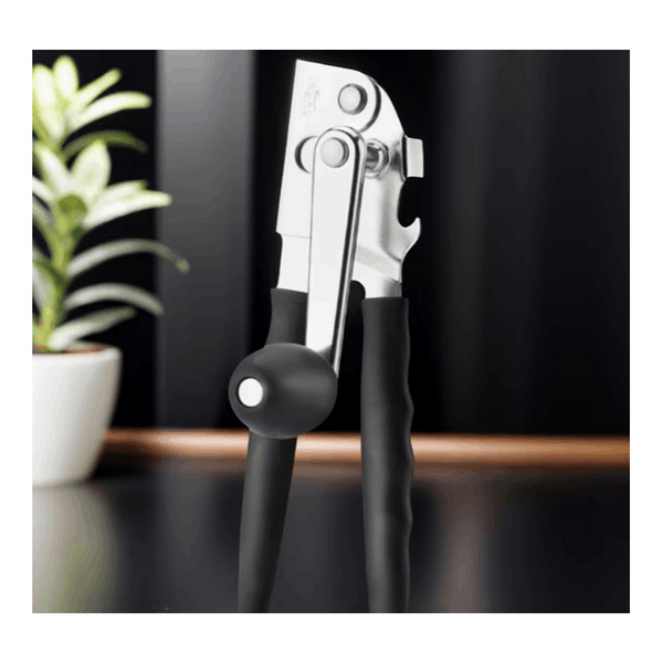 Multi-functional manual can opener stainless steel can and bottle opener in one non-slip labor-saving handle safe and without sharp edges suitable for kitchen tools for cans and bottle caps.