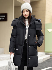 Sophisticated Winter Coat for Women Featuring a Hood And a Full Zipper, Perfect for Chilly Days. This Long-Sleeve Jacket Offers a Tailored Fit And Is Suitable for Both Outdoor And Everyday Travel. Dry Clean Only, Made with High-Quality Materials