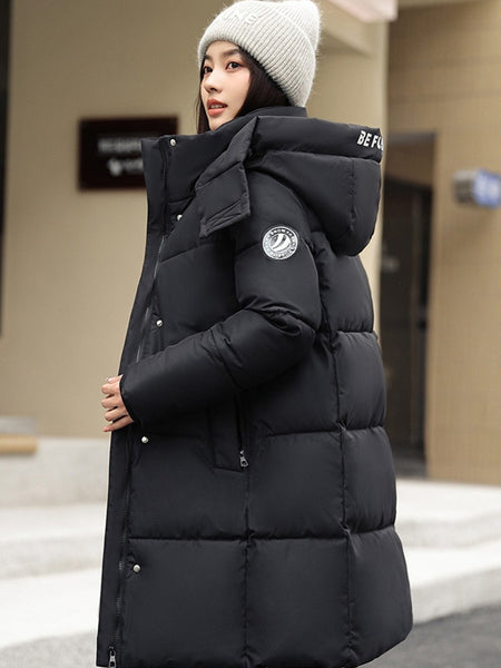 Sophisticated Winter Coat for Women Featuring a Hood And a Full Zipper, Perfect for Chilly Days. This Long-Sleeve Jacket Offers a Tailored Fit And Is Suitable for Both Outdoor And Everyday Travel. Dry Clean Only, Made with High-Quality Materials