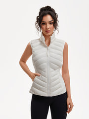 Women's Lightweight Outdoor Puffer Vest, Multi-Pocket Design, Elastic Waist Wrapping for Snug Warmth, Unique Zipper, Stand Collar, Polyester Filled