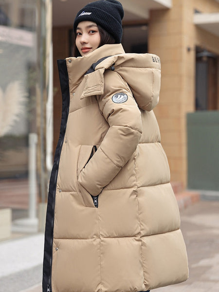 Sophisticated Winter Coat for Women Featuring a Hood And a Full Zipper, Perfect for Chilly Days. This Long-Sleeve Jacket Offers a Tailored Fit And Is Suitable for Both Outdoor And Everyday Travel. Dry Clean Only, Made with High-Quality Materials