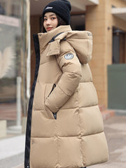 Sophisticated Winter Coat for Women Featuring a Hood And a Full Zipper, Perfect for Chilly Days. This Long-Sleeve Jacket Offers a Tailored Fit And Is Suitable for Both Outdoor And Everyday Travel. Dry Clean Only, Made with High-Quality Materials