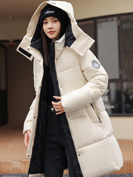 Sophisticated Winter Coat for Women Featuring a Hood And a Full Zipper, Perfect for Chilly Days. This Long-Sleeve Jacket Offers a Tailored Fit And Is Suitable for Both Outdoor And Everyday Travel. Dry Clean Only, Made with High-Quality Materials