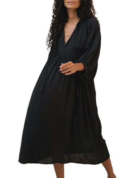 Casual Loose-Fitting Maxi Dress for Women with Lantern Sleeves, a V-Neck, And a Flowy Swing Design. Features 3/4 Puff Sleeves, Perfect for Boho Beach Outings, with a Tie-Up Front And Ruffled Details, Ideal for Vacations