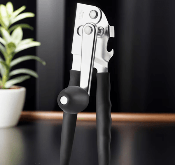 Multi-functional manual can opener stainless steel can and bottle opener in one non-slip labor-saving handle safe and without sharp edges suitable for kitchen tools for cans and bottle caps.