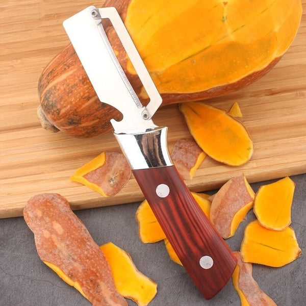 The 1-Part New Multifunctional Stainless Steel Peeler with Massive Wooden Handle Is an Indispensable Kitchen Tool for Easy And Quick Peeling of Fruit And Vegetables.