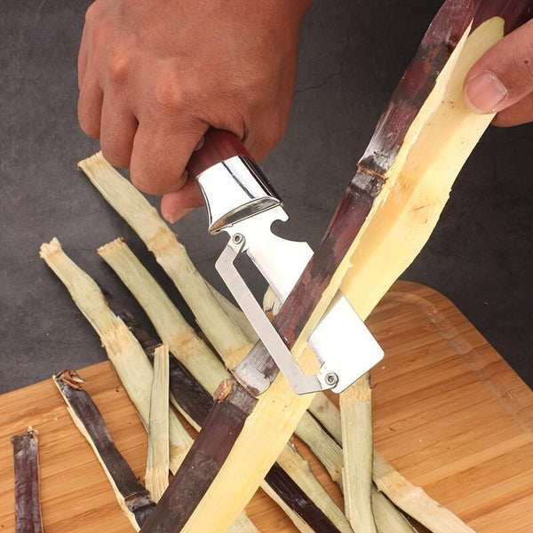 The 1-Part New Multifunctional Stainless Steel Peeler with Massive Wooden Handle Is an Indispensable Kitchen Tool for Easy And Quick Peeling of Fruit And Vegetables.