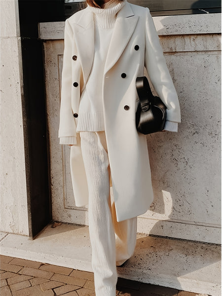 This Elegant Cream White Woolen Coat Features a Double-Breasted Design, Button Details, And a Slim Fit, Making It Perfect for Both Casual And Formal Events During The Fall And Winter Seasons.