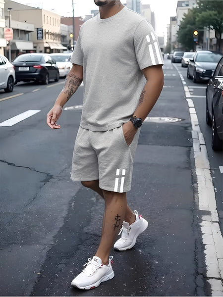 A Stylish Two-Piece Summer Outfit for Men, Featuring a Short-Sleeve Round-Neck T-Shirt And Shorts with Pockets
