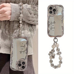 Mobile Phone Case with a Unique Electroplated Silver Design Featuring a Curved Edge Pattern And a Pearl Bracelet Lanyard. It'S Durable, Anti-Fall, And Compatible with Iphone 11 Through 16, Including Pro And Plus Versions