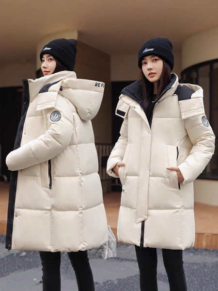 Sophisticated Winter Coat for Women Featuring a Hood And a Full Zipper, Perfect for Chilly Days. This Long-Sleeve Jacket Offers a Tailored Fit And Is Suitable for Both Outdoor And Everyday Travel. Dry Clean Only, Made with High-Quality Materials