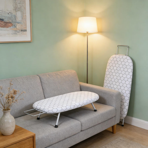 A Compact, Foldable Ironing Board Measuring 66X40Cm, Easy to Store And Lightweight, Making It Ideal for Small Living Spaces Like Apartments And Dorms. It Features Adjustable Height for Convenience