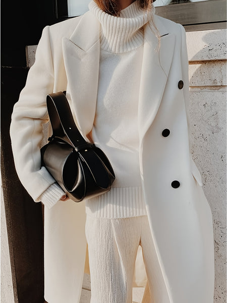 This Elegant Cream White Woolen Coat Features a Double-Breasted Design, Button Details, And a Slim Fit, Making It Perfect for Both Casual And Formal Events During The Fall And Winter Seasons.