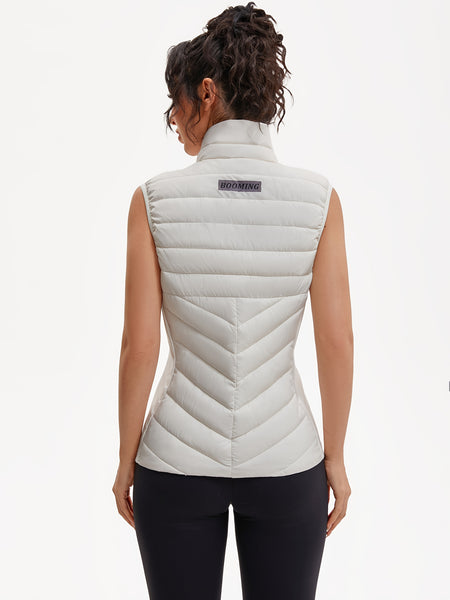 Women's Lightweight Outdoor Puffer Vest, Multi-Pocket Design, Elastic Waist Wrapping for Snug Warmth, Unique Zipper, Stand Collar, Polyester Filled