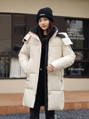 Sophisticated Winter Coat for Women Featuring a Hood And a Full Zipper, Perfect for Chilly Days. This Long-Sleeve Jacket Offers a Tailored Fit And Is Suitable for Both Outdoor And Everyday Travel. Dry Clean Only, Made with High-Quality Materials