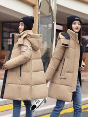 Sophisticated Winter Coat for Women Featuring a Hood And a Full Zipper, Perfect for Chilly Days. This Long-Sleeve Jacket Offers a Tailored Fit And Is Suitable for Both Outdoor And Everyday Travel. Dry Clean Only, Made with High-Quality Materials