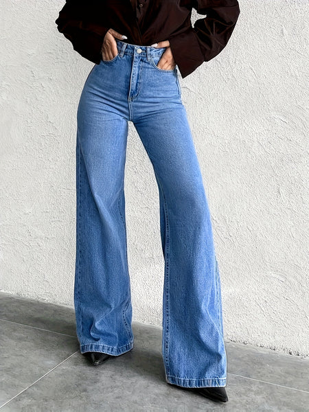 High-Waisted Mid-Blue Stretchy Denim Slightly Flared Pants That Enhance The Buttocks And Create a Effect in a European Style