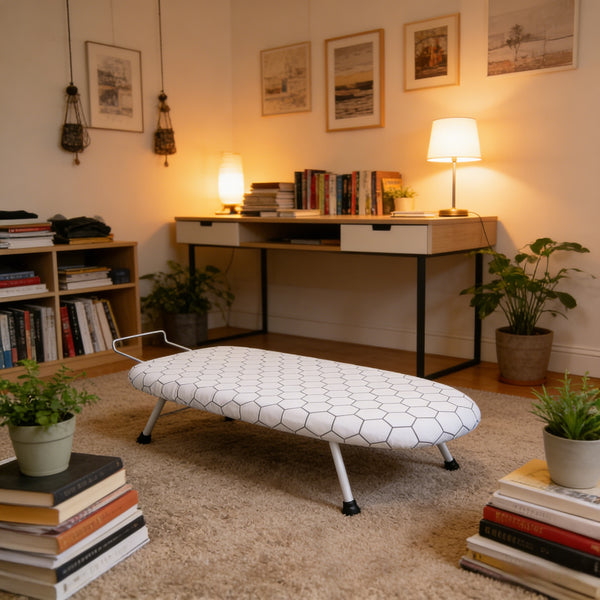 A Compact, Foldable Ironing Board Measuring 66X40Cm, Easy to Store And Lightweight, Making It Ideal for Small Living Spaces Like Apartments And Dorms. It Features Adjustable Height for Convenience