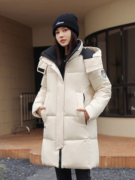 Sophisticated Winter Coat for Women Featuring a Hood And a Full Zipper, Perfect for Chilly Days. This Long-Sleeve Jacket Offers a Tailored Fit And Is Suitable for Both Outdoor And Everyday Travel. Dry Clean Only, Made with High-Quality Materials
