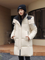 Sophisticated Winter Coat for Women Featuring a Hood And a Full Zipper, Perfect for Chilly Days. This Long-Sleeve Jacket Offers a Tailored Fit And Is Suitable for Both Outdoor And Everyday Travel. Dry Clean Only, Made with High-Quality Materials