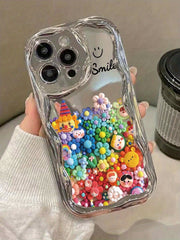 A Soft Protective Phone Case for Iphone 16/15/12/13/14 Featuring a Smiling Face Cartoon Design with an Electroplated Cream Pattern, Ideal for Women. It Is Shock-Proof, Stylish, And Thick.