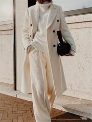 This Elegant Cream White Woolen Coat Features a Double-Breasted Design, Button Details, And a Slim Fit, Making It Perfect for Both Casual And Formal Events During The Fall And Winter Seasons.
