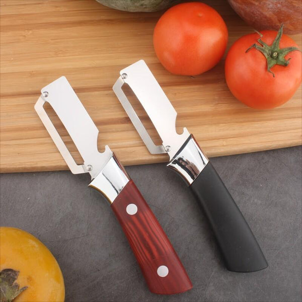The 1-Part New Multifunctional Stainless Steel Peeler with Massive Wooden Handle Is an Indispensable Kitchen Tool for Easy And Quick Peeling of Fruit And Vegetables.