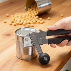 Multi-functional manual can opener stainless steel can and bottle opener in one non-slip labor-saving handle safe and without sharp edges suitable for kitchen tools for cans and bottle caps.