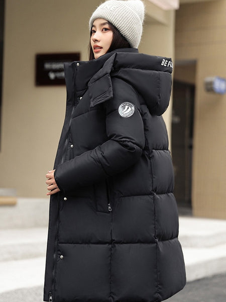 Sophisticated Winter Coat for Women Featuring a Hood And a Full Zipper, Perfect for Chilly Days. This Long-Sleeve Jacket Offers a Tailored Fit And Is Suitable for Both Outdoor And Everyday Travel. Dry Clean Only, Made with High-Quality Materials