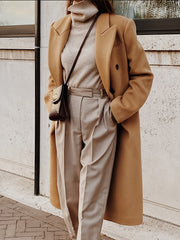 This Elegant Cream White Woolen Coat Features a Double-Breasted Design, Button Details, And a Slim Fit, Making It Perfect for Both Casual And Formal Events During The Fall And Winter Seasons.